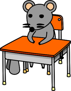 ネズミが机に座っている様子のイラスト画像